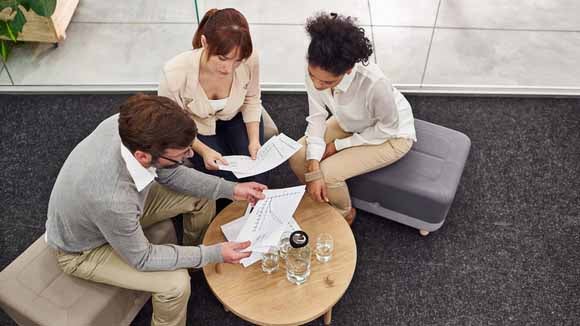 three_people_in_meeting three-people-in-meeting