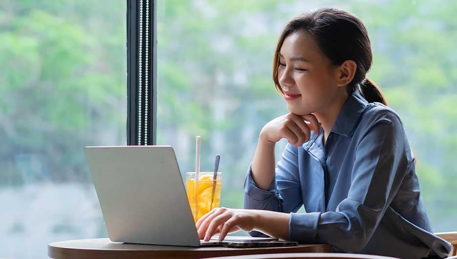 man typing down notes